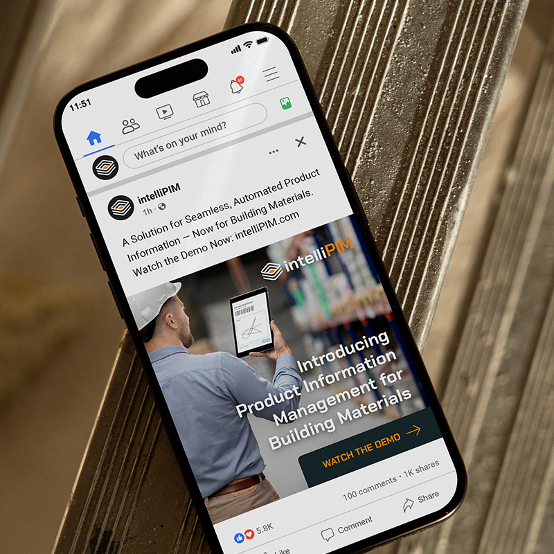 Smartphone displaying an IntelliPIM social media ad introducing their product information management solution for building materials.